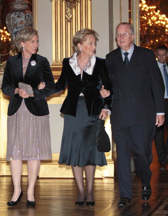Dans une atmosphère troublée, le roi Albert II et la reine Paola de Belgique, en compagnie seulement de la princesse Astrid et du prince Lorenz, donnaient mercredi 14 décembre 2011 leur traditionnel concert de Noël, au Palais, à Bruxelles.