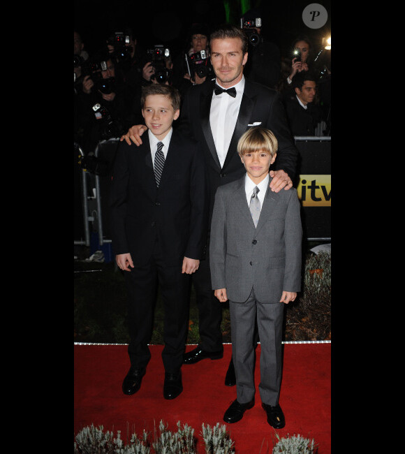 David Beckham et ses enfants Brooklyn et Romeo le 19 décembre 2011 à Londres