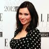 La rayonnante Sophie Ellis-Bextor montre son ventre rond dans une robe à pois à Londres, le 13 février 2012.