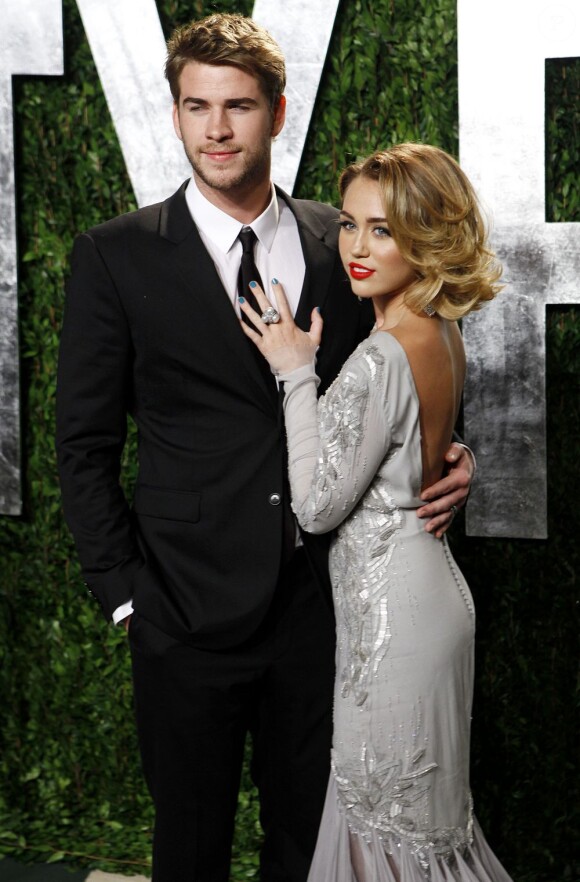 Liam Hemsworth et Myley Cyrus à l'after-party des Oscars organisée par le magazine Vanity Fair. Le 26 février 2012