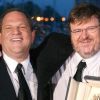Harvey Weinstein et Michael Moore, Palme d'or pour Bowling for Columbine, en mai 2004 à Cannes.