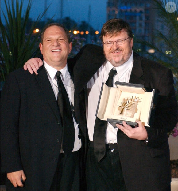 Harvey Weinstein et Michael Moore, Palme d'or pour Bowling for Columbine, en mai 2004 à Cannes.