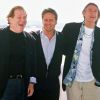 Harvey Weinstein, Michael Douglas et le réalisateur Joel Schumacher, en mai 1993 à Cannes.