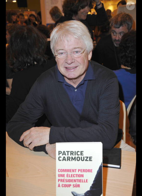 Patrice Carmouze signe quelques exemplaires de son livre au Salon du Livre de Paris, le samedi 17 mars 2012.