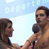 Laury Thilleman interviewe pour Eurosport Florent Manaudou après sa qualification (et l'échec de son beau-frère Fred Bousquet) pour les JO de Londres à l'issue du 50 m nage libre des championnats de France de Dunkerque, le 24 mars 2012.