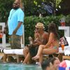 Shemar Moore, en très charmante compagnie, à la piscine de son hôtel, à Miami, le vendredi 4 mai 2012.