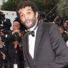 Ramzy Bédia le 21 mai 2012 lors de la montée des marches pour la présentation du film Vous n'avez encore rien vu dans le cadre du 65ème Festival de Cannes