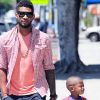 Usher et son fils en juin 2011