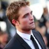 Robert Pattinson lors de la montée des marches du film Sur la route, au Festival de Cannes le 23 mai 2012.