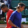 Jo-Wilfried Tsonga et Rafael Nadal le 24 mai 2012 à Roland Garros lors d'un essai pour les nouvelles raquettes intelligentes signées Babolat