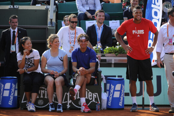 Li Na, Kim Clijsters, Rafael Nadal et Jo-Wilfried Tsonga le 24 mai 2012 à Roland Garros lors d'un essai pour les nouvelles raquettes intelligentes signées Babolat