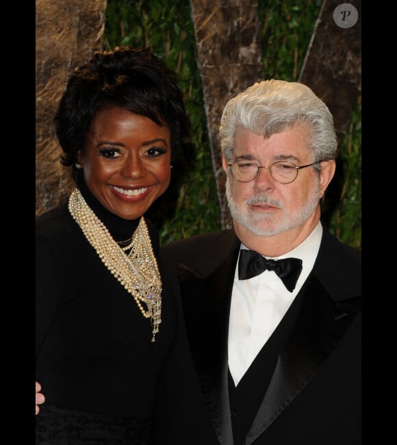 George Lucas et sa femme Mélanie Hobbson en février 2012 aux Oscars.