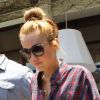 Miley Cyrus quitte son hôtel, à Miami, le jeudi 14 juin 2012.