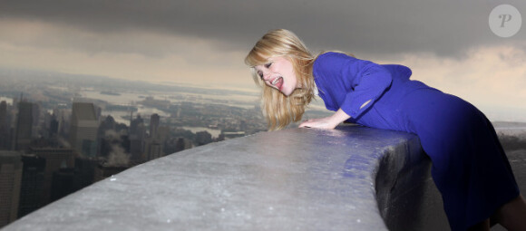 Emma Stone en haut de l'Empire State Building, le 25 juin 2012 à New York.