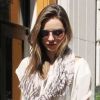 Miranda Kerr sort de son appartement. New York, le 28 juin 2012.