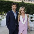 Diane Kruger accompagnée de Joshua Jackson sublime en 3.1 Phillip Lim et sandales Givenchy à la présentation Berluti. Paris, le 29 juin 2012.