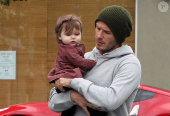Avec son papa David Beckham lors d'une sortie familiale à Los Angeles en mars 2012