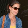 Malgré la fatigue accumulée ces derniers jours, Katie Holmes continue de s'accrocher pour sa petite Suri. Ici, elle retourne chez elle après un second rendez-vous avec ses avocats à Manhattan, New York, le 7 juillet 2012