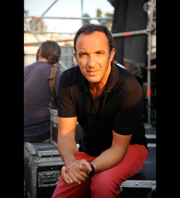 Nikos Aliagas, lors des répétitions du concert, au stade Kallimarmaro d'Athènes, le lundi 9 juillet 2012.