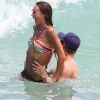 Kellan Lutz et Sharni Vinson, sur une plage de Miami, le mardi 10 juillet 2012.