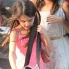 Suri Cruise et une copine entourées de Katie Holmes se rendent au Chelsea Pier à Manhattan le 12 juillet 2012