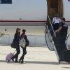 Anne Hathaway quittant, depuis l'aéroport du Bourget, la France le 21 juillet 2012 après l'annulation de la promotion du film The Dark Knight Rises. Il s'agit d'une conséquence directe de la fusillade qui a eu lieu dans le Colorado durant une avant-première du film