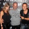 Christian Audigier en grande forme au VIP Room de Jean-Roch, le samedi 28 juillet 2012. Le styliste, d'humeur partageuse, a acheté 500 bouteilles de champagne pour les offrir aux clubbers !