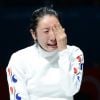 La Sud-Coréenne Shin Lam refuse de quitter la piste après sa défaite lors des Jeux olympiques de Londres le 30 juillet 2012
