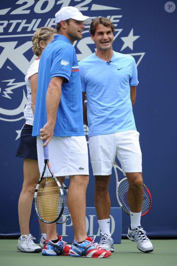 Andy Roddick et Roger Federer lors de l'Arthur Ashe Kids' Day à l'USTA Billie Jean King National Tennis Center lors de l'US Open le 25 août 2012 à New York