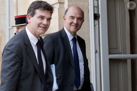 Arnaud Montebourg, ministre du Redressement productif, et Pierre Moscovici, ministre de l'Économie et des Finances, au palais de l'Elysée, le 25 juin 2012. à Paris, le 9 octobre 2011.