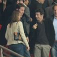 Martina Hingis et son mari Thibault Hutin, Patrick Bruel lors du match de Ligue des champions entre le PSG et le Dynamo Kiev (4-1) le 18 septembre 2012 au Parc des Princes à Paris