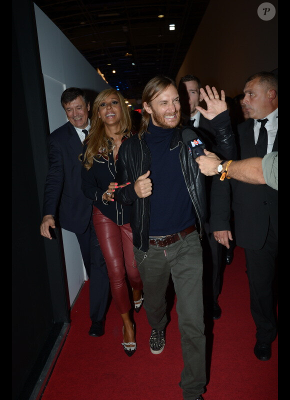 David et Cathy Guetta au Mondial de l'Auto 2012 à Paris, le jeudi 27 septembre 2012, pour présenter la Renault Twizy by David & Cathy Guetta, dont ils sont les créateurs.
