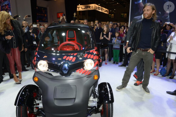 David et Cathy Guetta au Mondial de l'Auto 2012 à Paris, le jeudi 27 septembre 2012, pour présenter la Renault Twizy by David & Cathy Guetta, dont ils sont les créateurs.