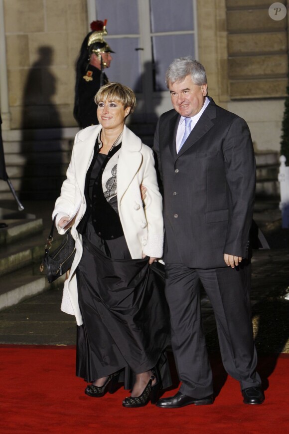 Eric Raoult et sa femme à L'Elysée, le 10 mars 2008.