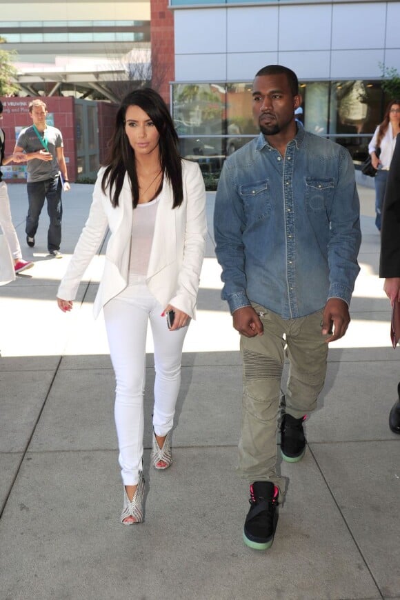 Kim Kardashian, début juillet, avec un corps plus svelte. Elle s'affichait dans des looks près du corps aux côtés de Kanye West.