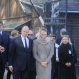 Albert et Charlène de Monaco ont visité le camp de concentration d'Auschwitz dans le cadre de leur visite officielle en Pologne, le 19 octobre 2012.