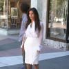 Kim et Kourtney Kardashian, accompagnées de leur ami Jonathan Cheban, font du shopping a Miami, le 29 octobre 2012