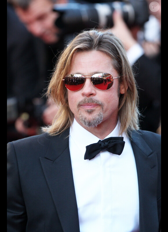 Brad Pitt lors de la montée des marches du film Killing Them Softly lors du 65e Festival du film de Cannes, le 22 mai 2012.