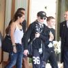 Madonna, Lourdes et Rocco quittant leur hôtel parisien, le 14 juillet 2012.