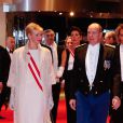  Le prince Albert et la princesse Charlene de Monaco, portant les insignes de Grand-Croix de l'Ordre de Saint-Charles reçus au Forum Grimaldi pour l'opéra de Puccini  La Fianciulla del West  lors de la soirée de gala de la Fête nationale à Monaco le 19 novembre 2012. 