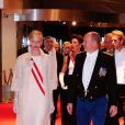  Le prince Albert et la princesse Charlene de Monaco, portant les insignes de Grand-Croix de l'Ordre de Saint-Charles reçus au Forum Grimaldi pour l'opéra de Puccini  La Fianciulla del West  lors de la soirée de gala de la Fête nationale à Monaco le 19 novembre 2012. 