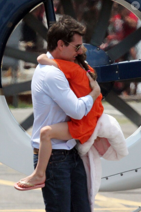 Tom Cruise avec sa fille Suri le 18 juillet 2012 à New York.