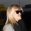 Reese Witherspoon arrive à l'aéroport de Los Angeles, le 4 decembre 2012.