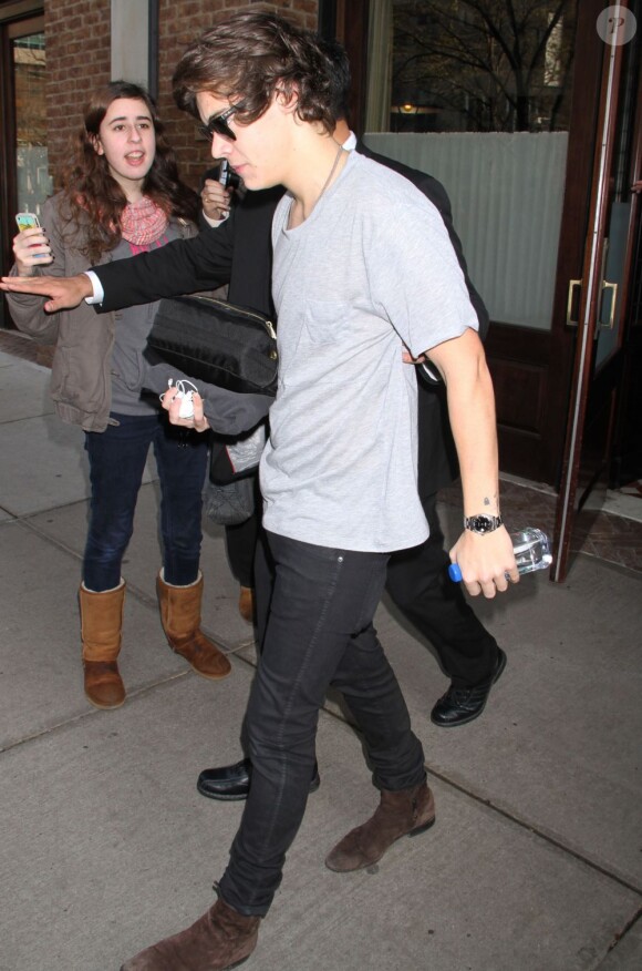 Harry Styles et Taylor Swift sortent de l'hôtel de la chanteuse à New York le 4 décembre 2012.