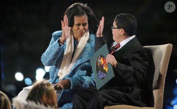 Michelle Obama et Rico Rodriguez ont lu un compte de Noël le 6 décembre 2012 face à un public de 17 000 personnes.