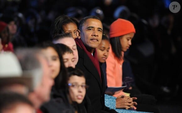 Président Obama, Michelle Obama Malia et Sasha le 6 décembre 2012 à Washington.