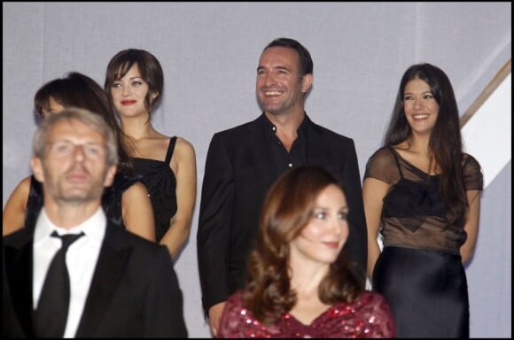 Jean Dujardin entouré de Marion Cotillard et Mélanie Doutey en décembre 2010 à Marrakech