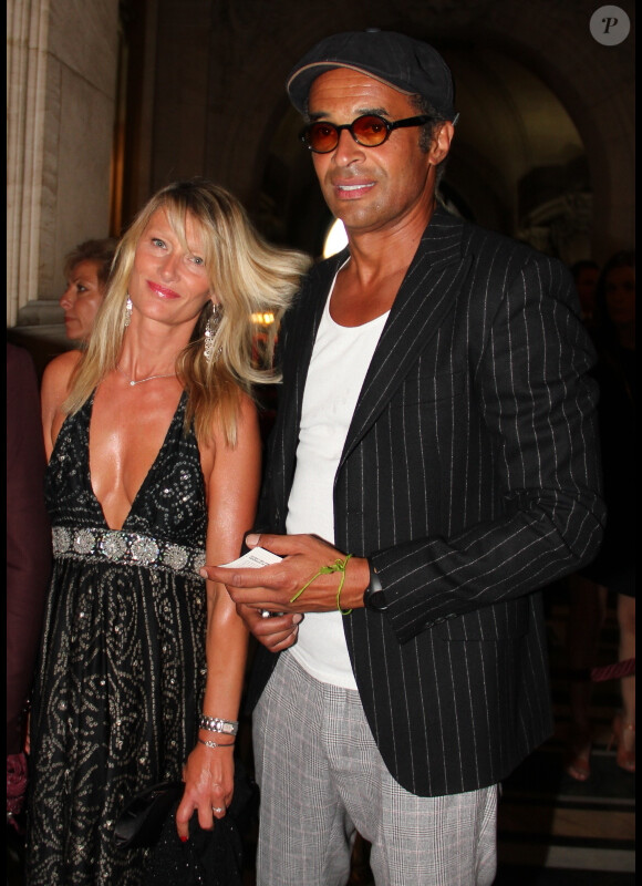 Yannick Noah et sa compagne Isabelle Camus, au concert Symphonica de George Michael à Paris, le 9 septembre 2012.