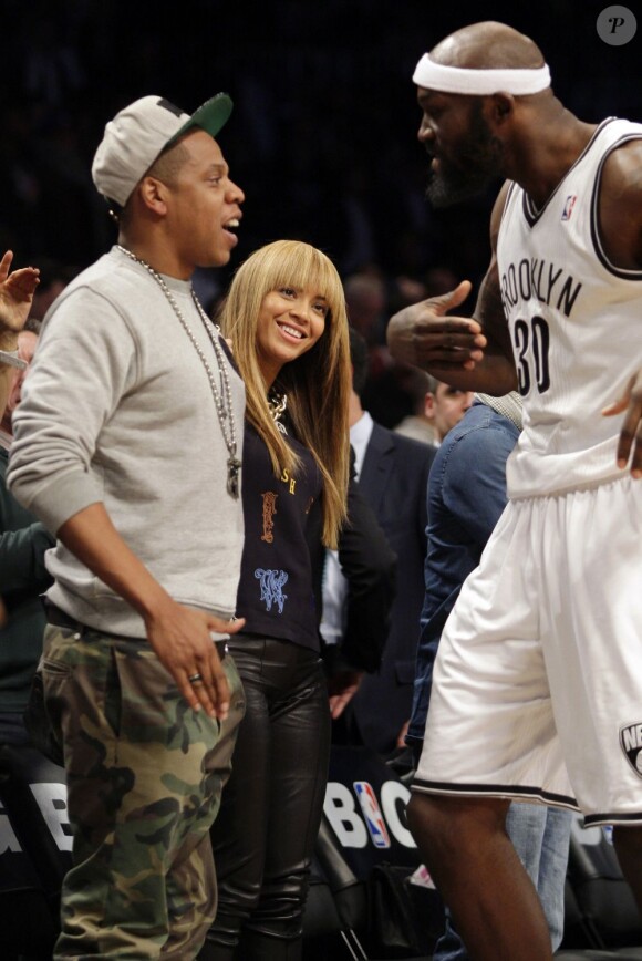 Beyoncé Knowles et Jay-Z lors d'un match des Nets de Brooklyn au Barclays Center de New York le 26 novembre 2012