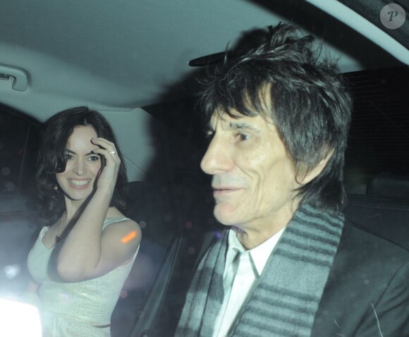 Ronnie Wood et sa femme Sally en voiture après après la soirée Tommy Hilfiger à Londres le 7 Janvier 2013.